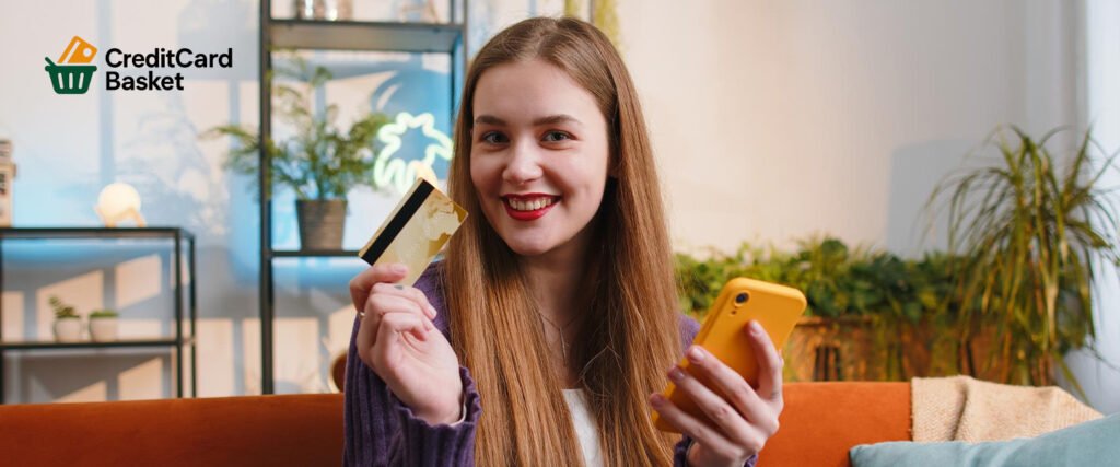 best secured credit card - A happy young woman holding her new credit card, showcasing how easy it is to apply for credit card online in 2026.