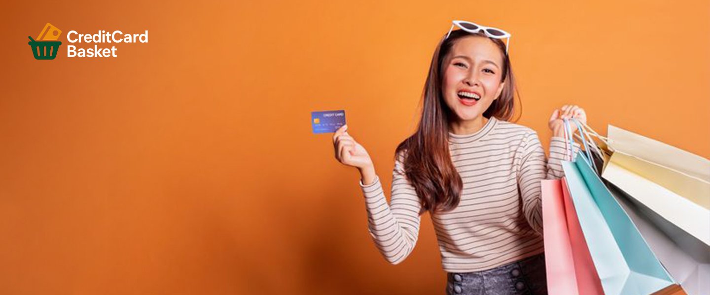 (credit cards for student) - A teenage girl happily holding her new credit card, representing the financial independence gained with student credit cards in 2026.